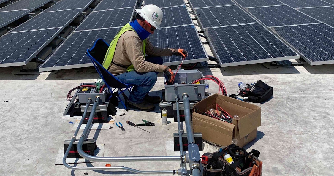 Borrego worker projecting repairs on a solar project